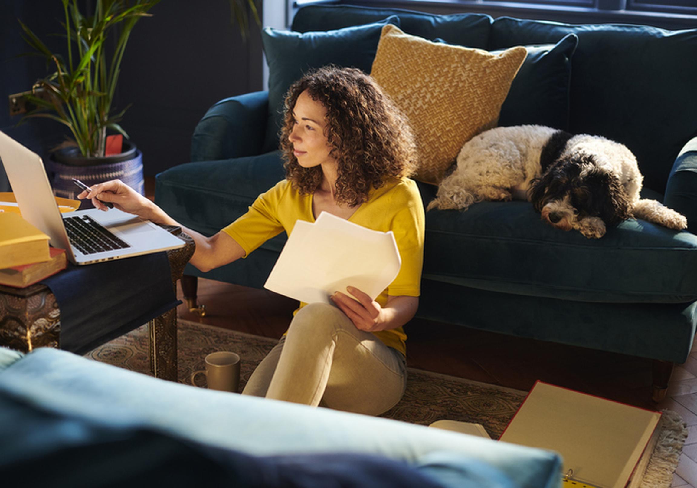 Woman looking at laptop